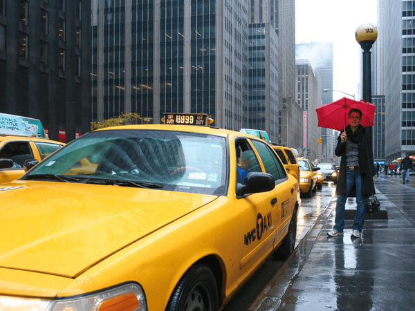 man infront of supreme taxi uk